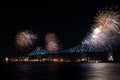 Colorful fireworks explode over bridge. MontrealÃ¢â¬â¢s 375th anniversary. luminous colorful interactive Jacques C Royalty Free Stock Photo